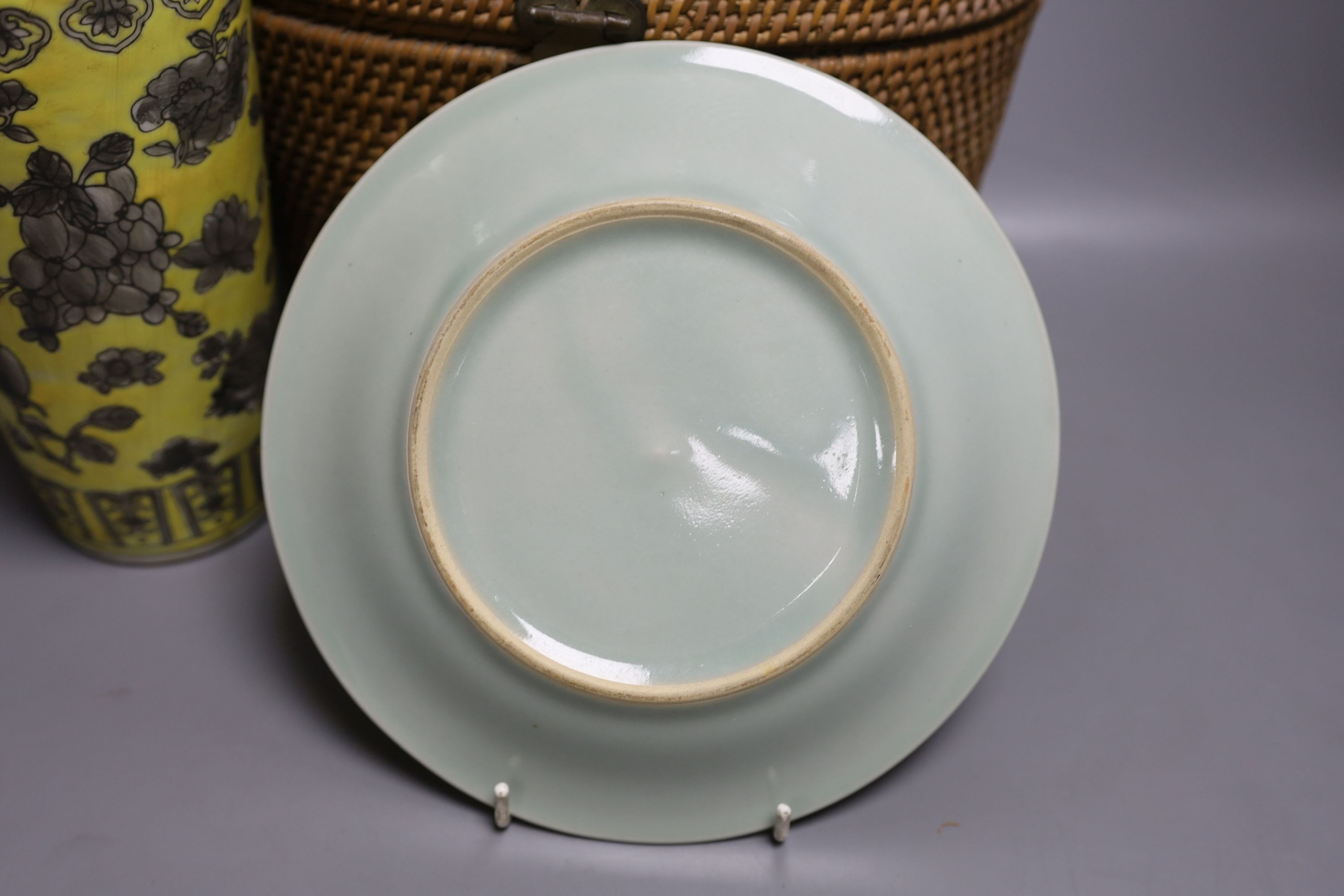 Two wicker-cased Chinese porcelain teapots together with a Chinese celadon dish and yellow vase, 28cm tall, (4)
